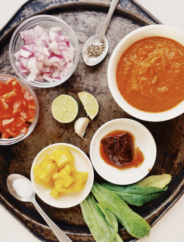 Salsa ingredients; red onion, chipotle in adobo, pineapple, diced tomato, oven roasted tomato sauce, lime, garlic and cilantro