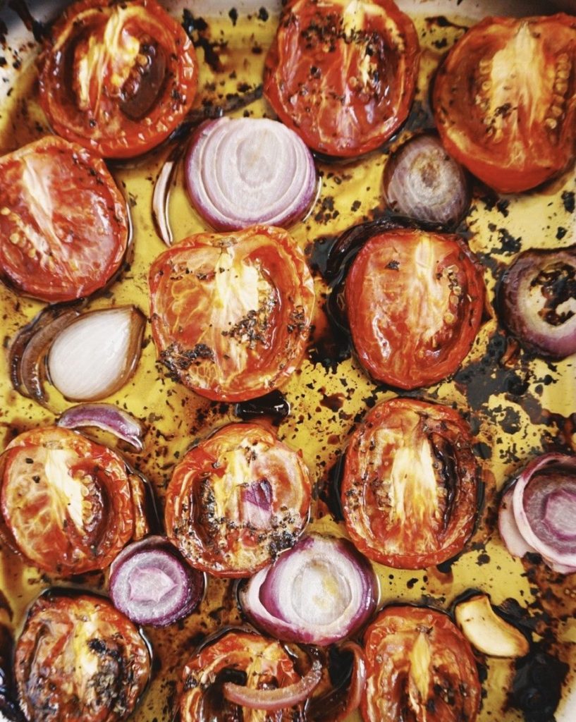 roasted tomatoes ready to blended into oven roasted tomato sauce