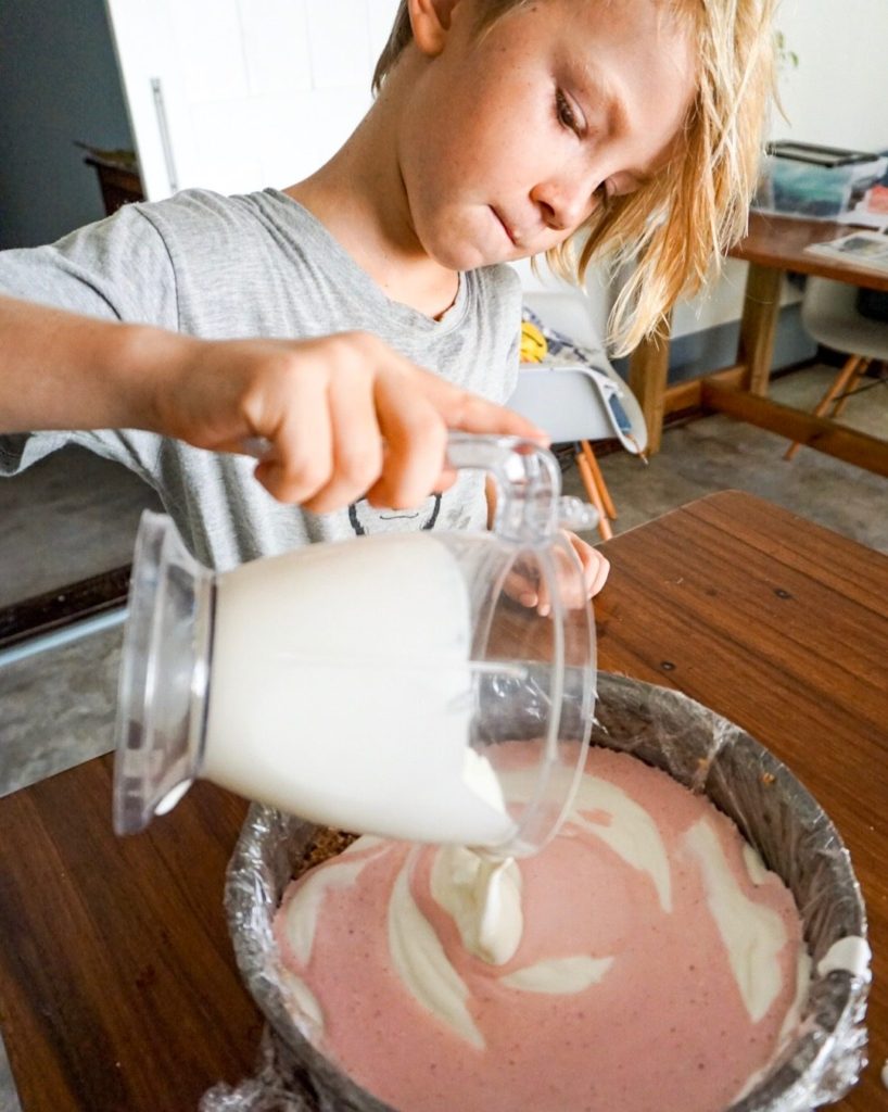 pouring the filling into the baking tin