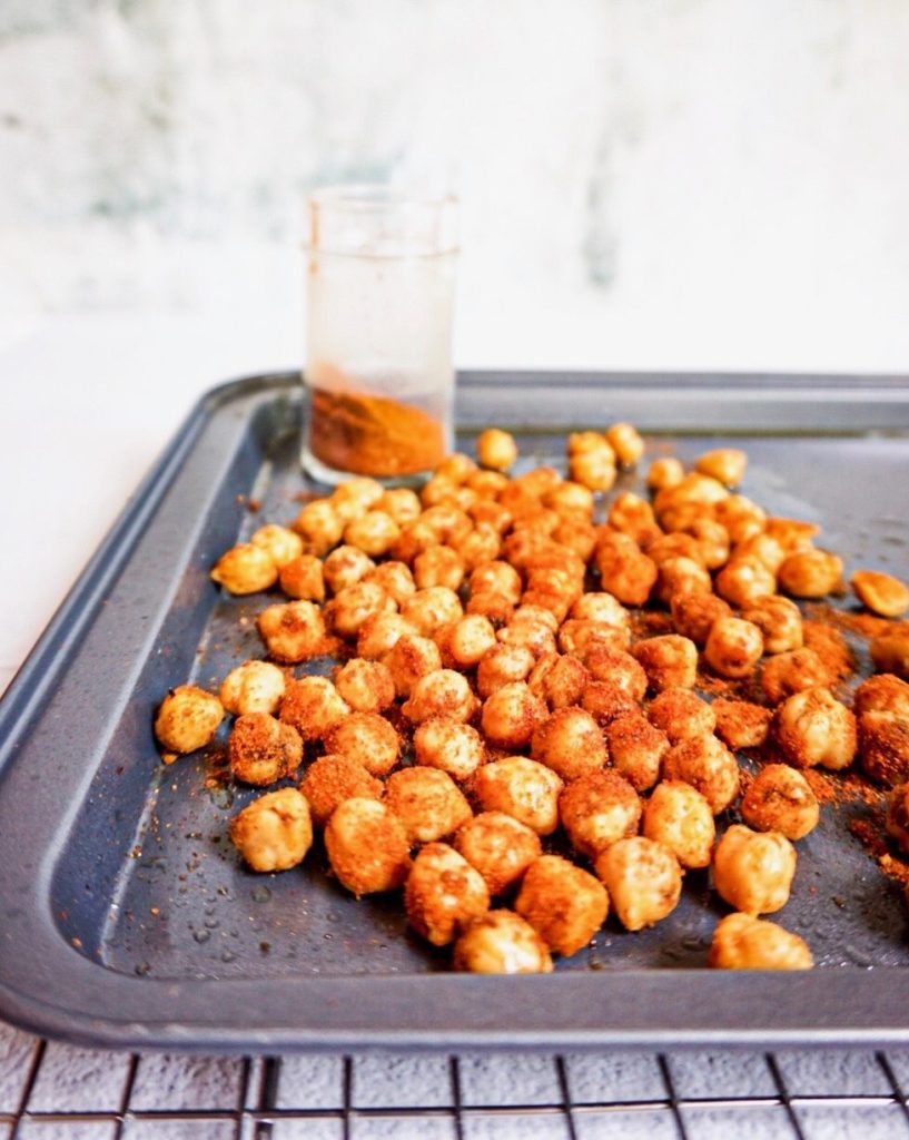 seasoned chickpeas on a baking tray