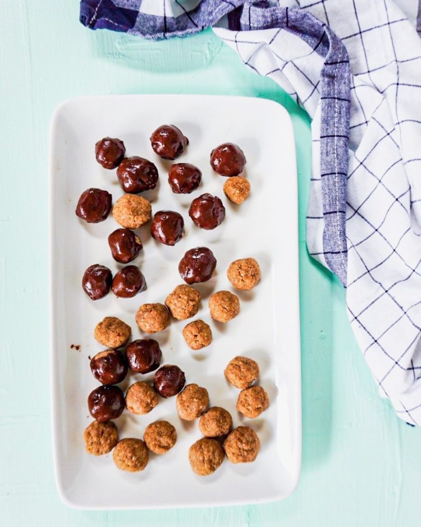 pepernoten half covered in chocolate