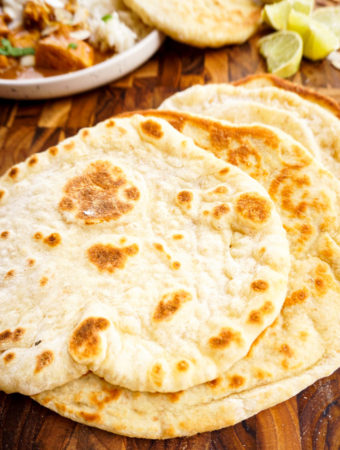 naan breads on cutting board