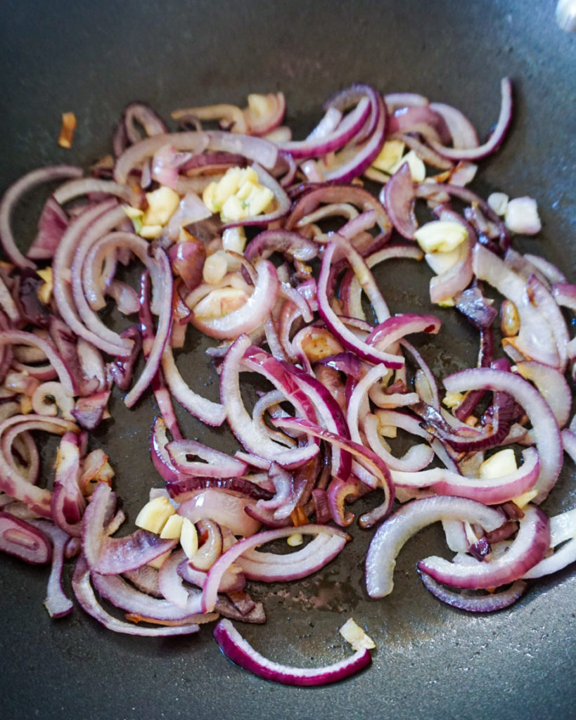 red onions in a skillet