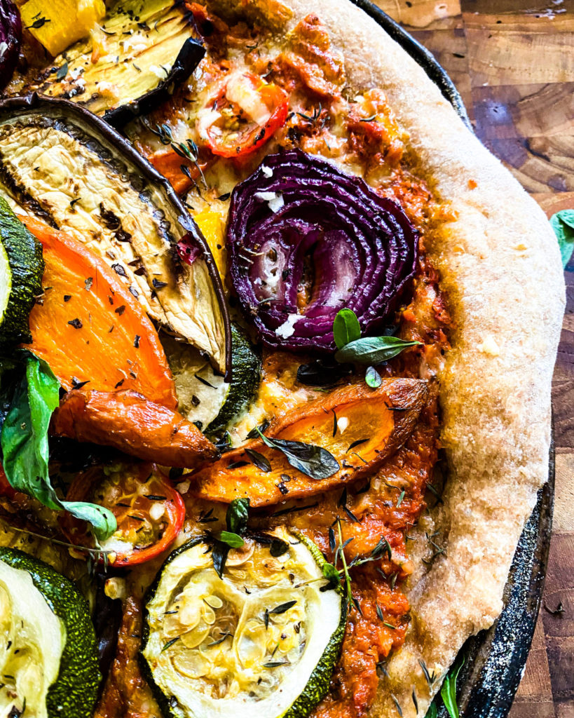 close up roasted veggies pizza