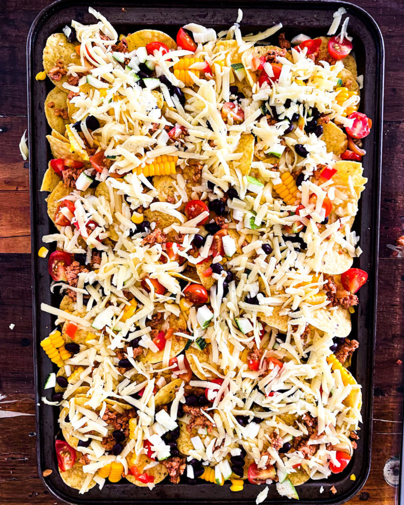 nachos ready to go into the oven