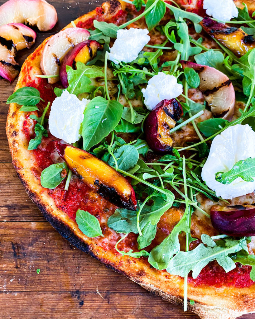 Grilled peach labneh pizza
