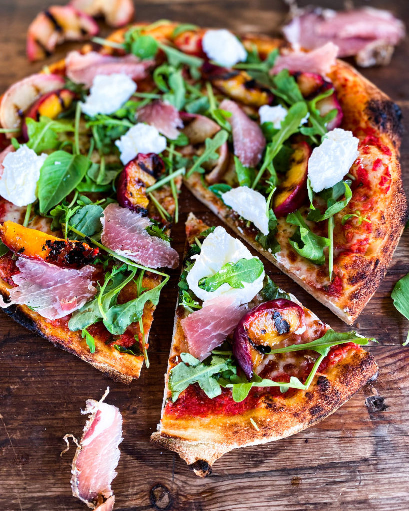 Grilled peach labneh and prosciutto on a simple margharita pizza