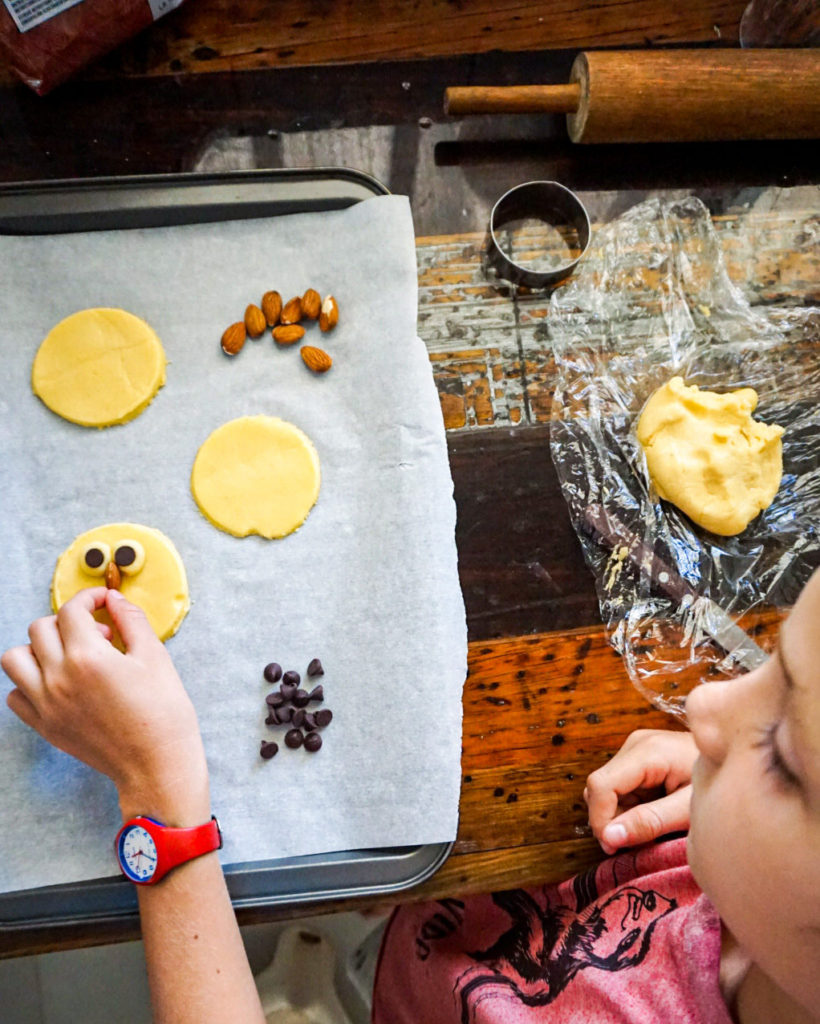 Jack decorating owl cookies