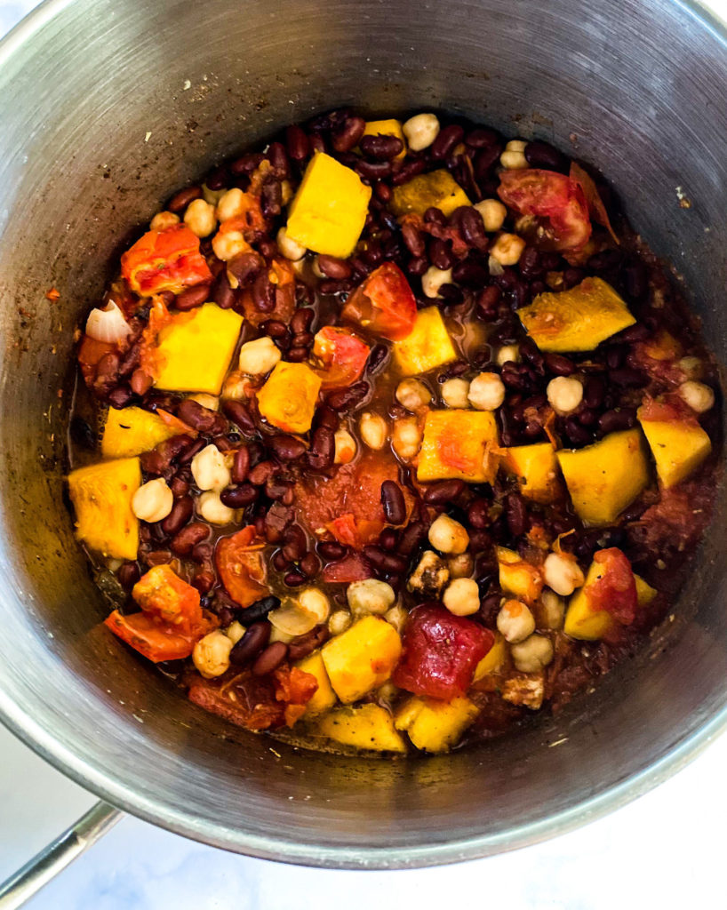 all chili ingredients cooking in a pot