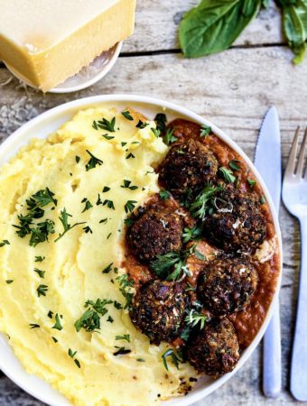 plate of vegan meatballs in tomato sauce