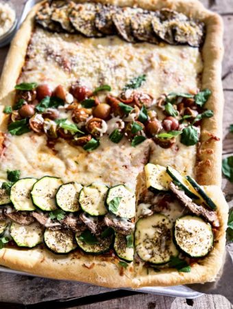 a square cut off the family sheet pan pizza