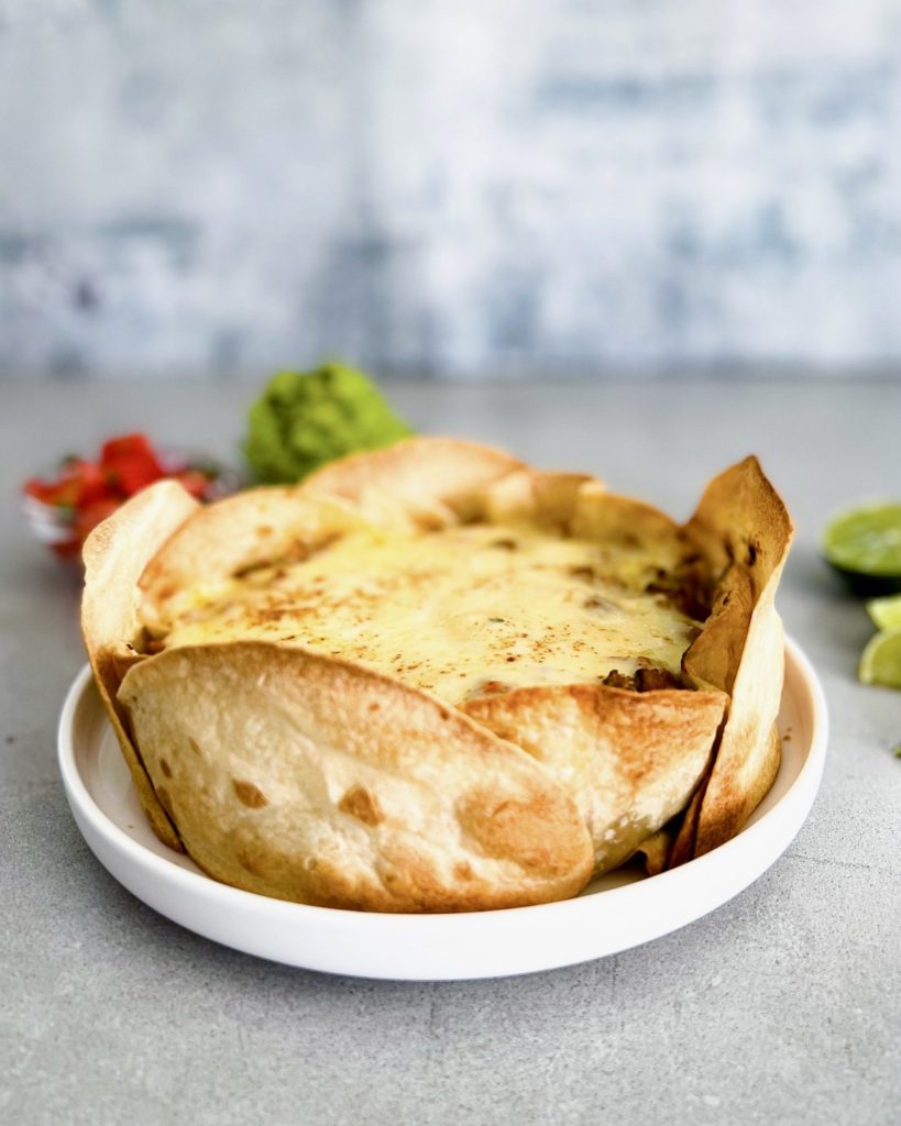 Taco pie with garnishing on the side