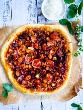 whole roasted cherry tomato pizza with onion spread