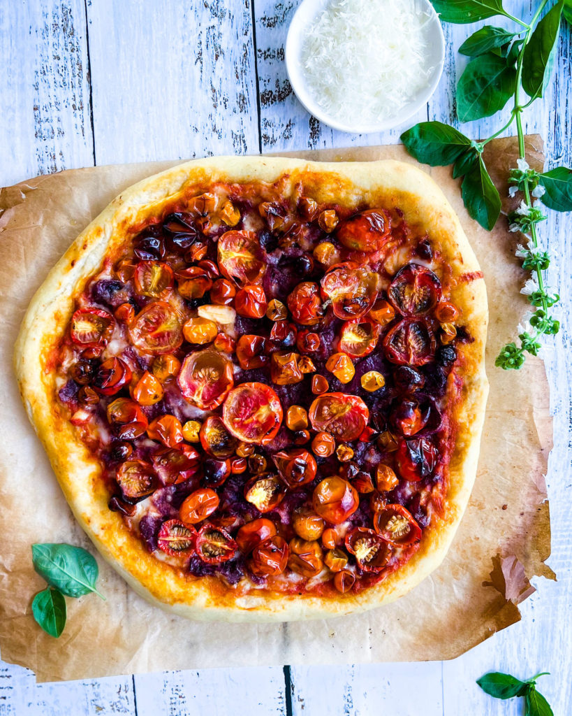 whole roasted cherry tomato pizza with onion spread