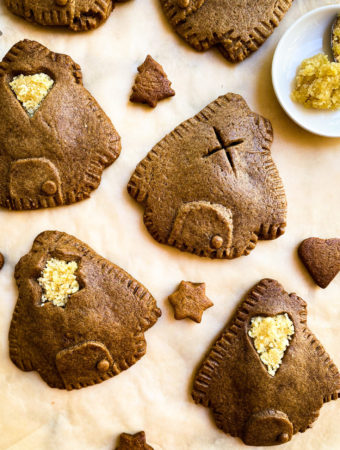 gingerbread house cookies with almond paste filling close up