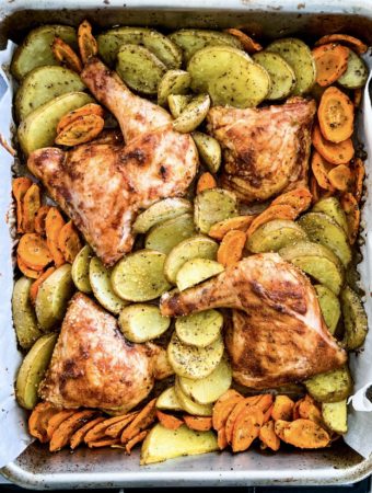 lemon baked chicken and potatoes bake tray just out of the oven
