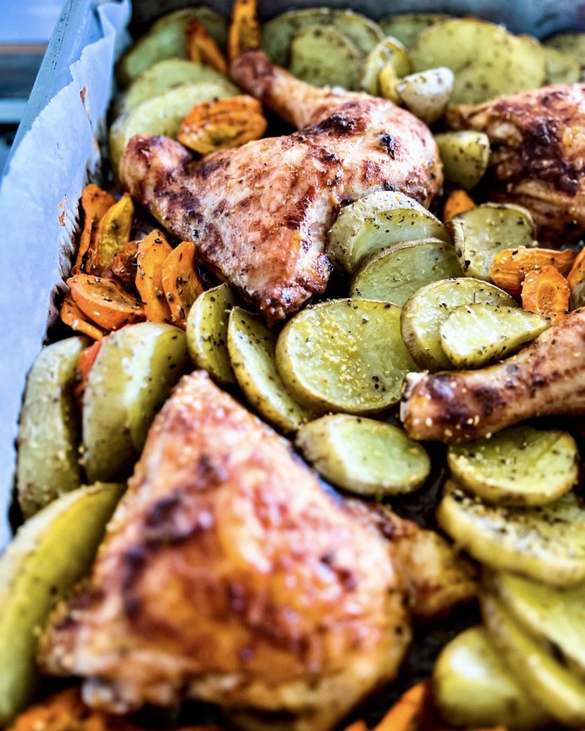 lemon baked chicken and potatoes close up