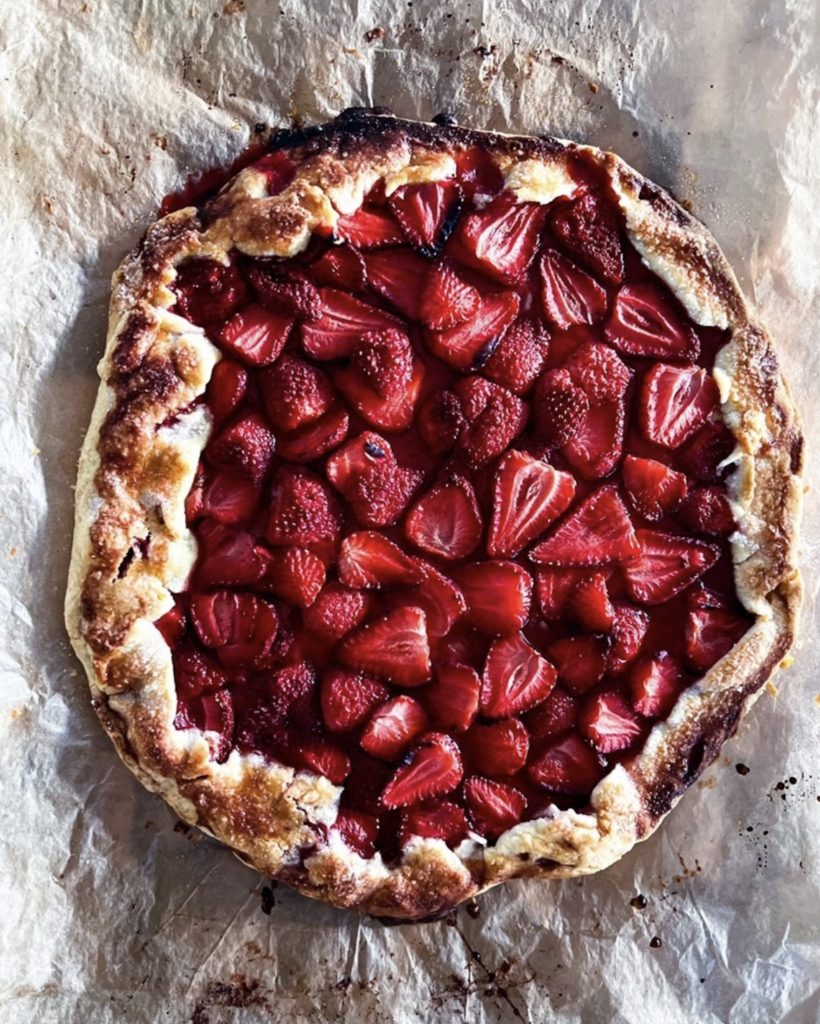 Strawberry galette on parchment paper