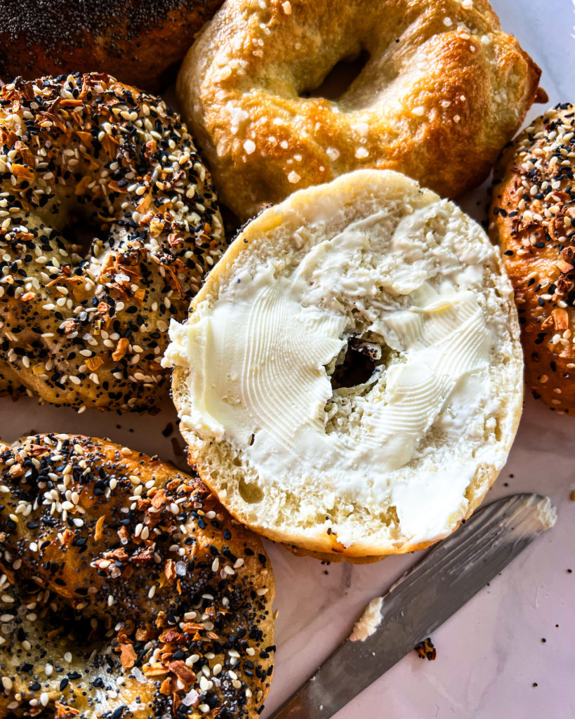 Close up of a bagel with cream cheese